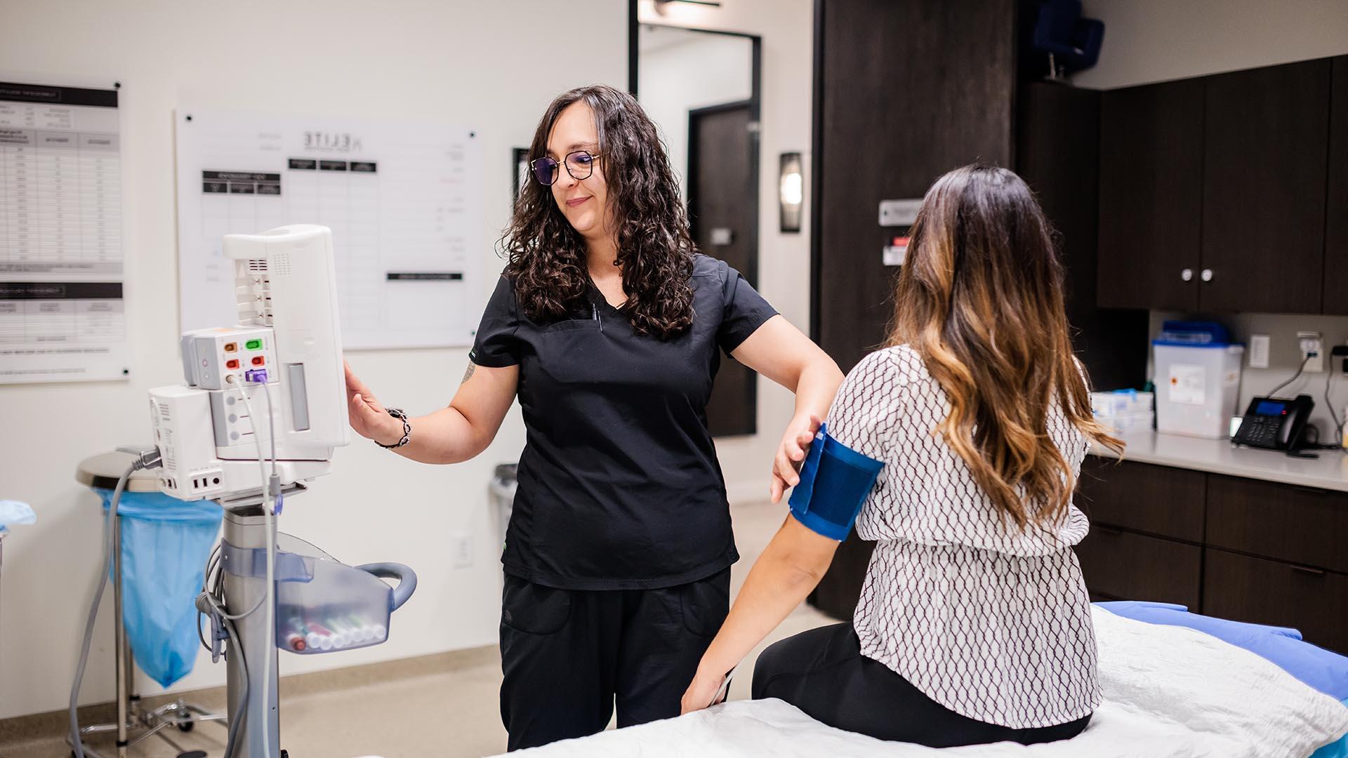 MSU Denver alumna Alejandra Webster, a recipient of the Deferred Action for Childhood Arrivals program, became a registered nurse in 2021 and just started a new job at a private clinic. Photo by Alyson McClaran