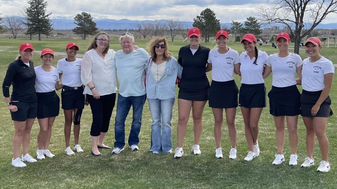Members of the O'Neill family, including Tim O'Neill, pose with the MSU Denver women's golf team at CommonGround Golf Course.